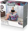 The image shows the packaging of an inflatable chair, with a lifestyle image of a girl sitting on the chair on the front. Produktbild-Vorschau
