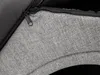 A close-up view of the textured fabric and zipper of a dog house. Náhled obrázku produktu
