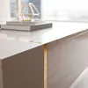 A close-up view of a modern coffee table with a glossy surface and gold accents. Produktbild-Vorschau