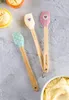 Mini grattoir en silicone avec manche en bois 3 pièces Voir les images du produit 6