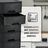 A stack of black plastic drawers with a graphic overlay highlighting features. Produktbild-Vorschau