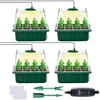 Four identical seed starter trays with clear lids and grow lights, along with gardening tools and plant markers, are displayed against a white background. Produktbild-Vorschau