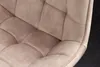A close-up view of the tufted upholstery of a chair. Produktbild-Vorschau