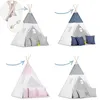 A collage of four different tipi tents for children, each with different colored patterns and pillows. Podgląd zdjęcia produktu