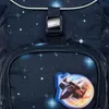 Close-up of a dark blue backpack with a space-themed pattern, featuring a buckle with the 'ergobag' logo and a sticker of a spaceship. Náhled obrázku produktu