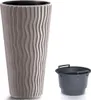 A tall, textured planter and a separate inner pot are shown against a white background. Náhľad obrázku produktu