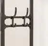 A close-up view of a black coat rack with multiple hooks. Náhľad obrázku produktu