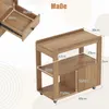 A close-up view of a wooden side table with dimensions indicated by measurement lines and text. Produktbild-Vorschau