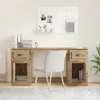 A desk with a chair in front of it, set up in a home office or study environment. Voir les images du produit