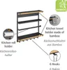 A diagram showing a kitchen shelf with labels pointing out its features like a kitchen roll holder, towel holder, and hooks. Voir les images du produit