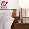 A bedside table with a wooden alarm clock and a lamp. Náhľad obrázku produktu