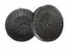 Two round black charcoal filters for a kitchen hood, shown from a slightly angled front view against a white background. Produktbild-Vorschau