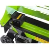 A close-up view of a green and black log splitter, focusing on the splitting mechanism and a wheel. Náhled obrázku produktu