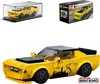 A collage of images showing a yellow toy car model, its packaging, and a display case. Produktbild-Vorschau