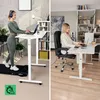 A split image showing two different home office setups. The left side features a woman using a treadmill desk, while the right side shows a woman sitting at a traditional desk. Produktbild-Vorschau