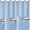 Close-up of light blue curtains with grommets. Produktbild-Vorschau