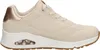 A side view of a single women's sneaker on a white background. Anteprima dell’immagine prodotto