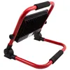 A red and black LED work light is shown from a side angle against a white background. Produktbild-Vorschau
