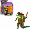 A Teenage Mutant Ninja Turtles action figure in its packaging and displayed separately. Anteprima dell’immagine prodotto