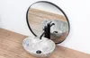 A bathroom sink and faucet are shown in front of a mirror. Anteprima dell’immagine prodotto