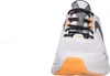 A close-up front view of a white Skechers sneaker with black laces and orange accents. Voir les images du produit