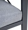 A close-up view of a gray cushion on a dark gray metal frame, likely part of an outdoor lounge set. Produktbild-Vorschau