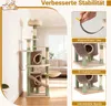 A multi-level cat tree with various platforms, perches, and hiding spots, set up in a living room environment. Produktbild-Vorschau