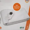 The image shows the packaging of an electric underblanket, with the product itself partially visible and folded. Náhľad obrázku produktu