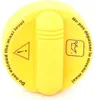 A yellow cap with warning symbols and text. Náhled obrázku produktu