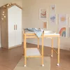 A nursery room with a baby changing table and wardrobe. Produktbild-Vorschau