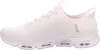 A side view of a beige Skechers sneaker. Produktbild-Vorschau