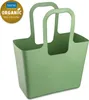A green Koziol bag on a white background. Náhled obrázku produktu