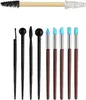 A collection of sculpting and modeling tools arranged in a line against a white background. Produktbild-Vorschau