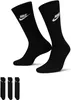 Two pairs of black Nike crew socks are displayed prominently, with three additional pairs shown in a smaller arrangement below. Produktbild-Vorschau