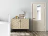 A modern living room with a light wood door and a decorative cabinet. Produktbild-Vorschau