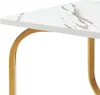 A close-up view of a table with a marble-look top and gold legs. Náhled obrázku produktu