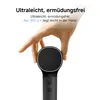 A hand holding a black hair dryer handle with a circular attachment. Voir les images du produit