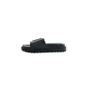 A single black slide sandal is shown from the side on a white background. Podgląd zdjęcia produktu