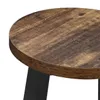 A close-up view of the wooden tabletop and a black metal leg of a stool or chair. Náhľad obrázku produktu