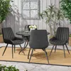 An outdoor patio setting with a dining set and plants. Produktbild-Vorschau