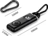 A black personal alarm with a carabiner clip, with dimensions indicated by lines and text. Produktbild-Vorschau