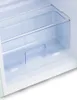 Close-up view of the interior of a refrigerator, showing a clear plastic drawer and shelving. Produktbild-Vorschau