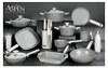 A collection of cookware and kitchen utensils arranged on a dark surface. Podgląd zdjęcia produktu