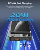 A black power bank with a digital display and a USB-C cable plugged in, set against a background of blue and black light streaks. Produktbild-Vorschau