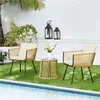 A patio set with two chairs and a table next to a swimming pool. Produktbild-Vorschau