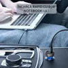 A person is using a laptop in a car, with a car charger plugged into the car's console and connected to the laptop. Náhľad obrázku produktu