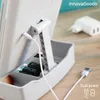 Close-up of the back of a white LED makeup mirror with a charging cable connected, resting on a wooden surface. Anteprima dell’immagine prodotto