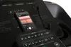 A close-up view of a treadmill's control panel with a smartphone placed in the holder. Podgląd zdjęcia produktu