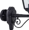A close-up view of a black and silver outdoor wall lamp fixture, showing mounting details and decorative scrollwork. Anteprima dell’immagine prodotto