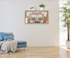 A living room scene with a blue sofa and a wooden wall shelf. Produktbild-Vorschau